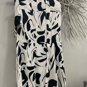 White and black belted satin dress